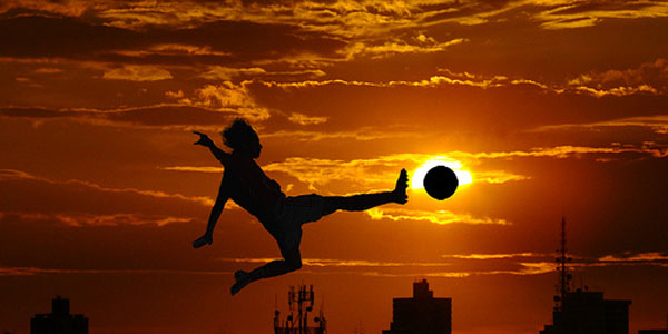 Healthy Person Playing Soccer at Sunset